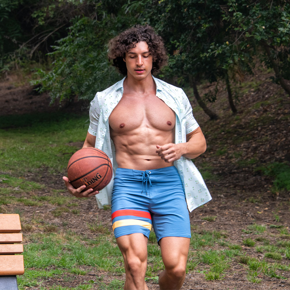 Charlie Santana Wearing Hurley Shirt and Shorts