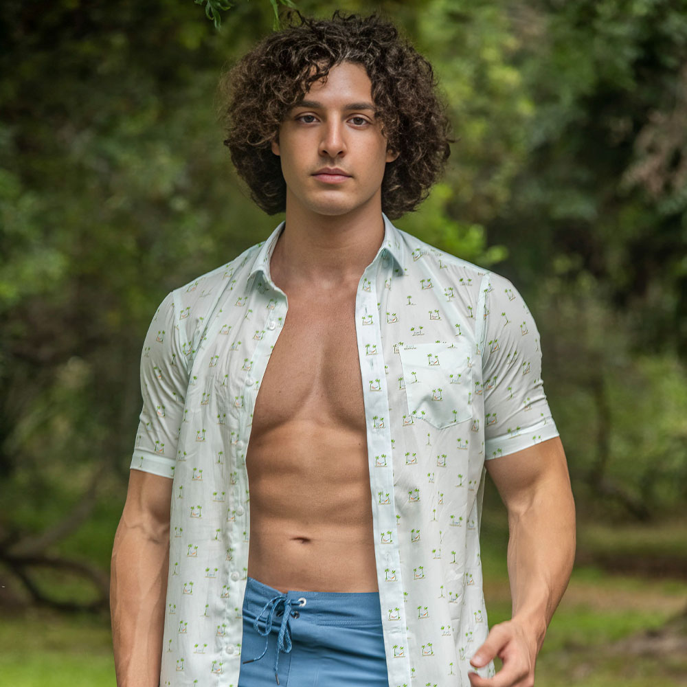 Charlie Santana Wearing Hurley Shirt and Shorts